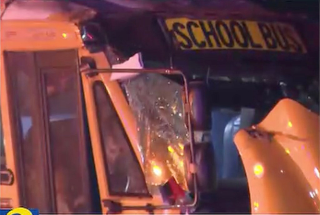 25 hurt when elderly driver of Ga. High school football bus loses control and flipps over