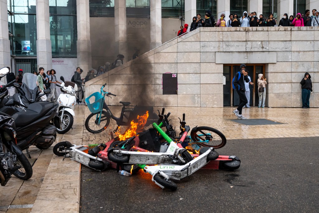 Boy, 15, arrested after being caught on video blasting fire in woman’s face during France’s student riots