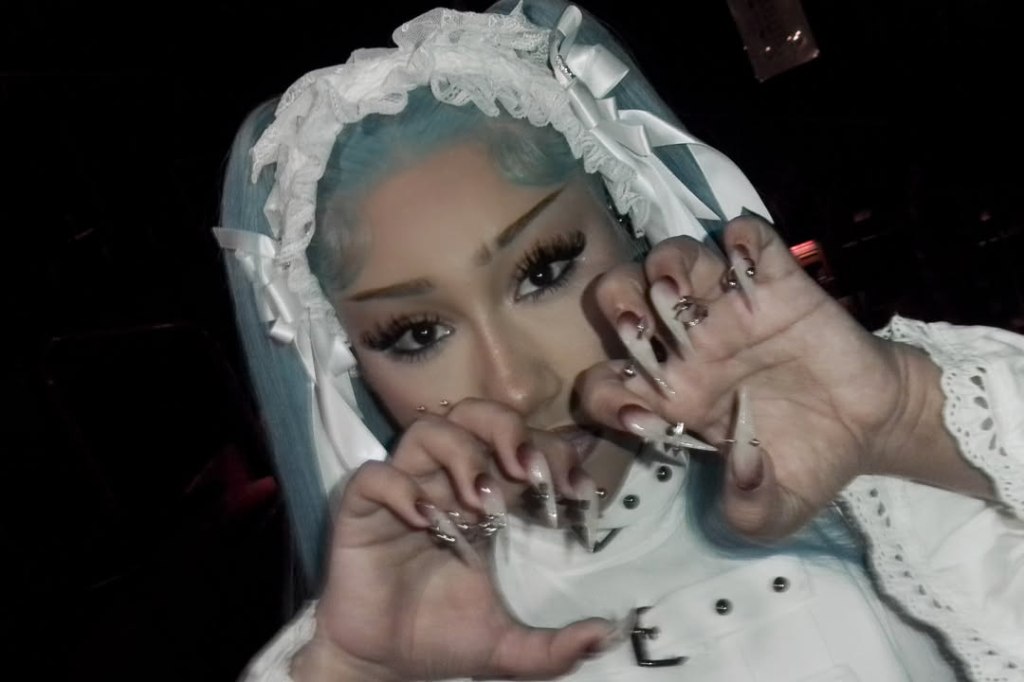 Kim Kardashian transforms into 13-year-old daughter North West for Halloween — including blue hair and piercings