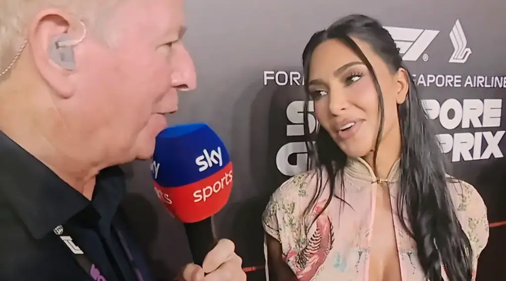 Kim Kardashian jokes with presenter after an awkward viral encounter at Monaco Grand Prix sparked backlash