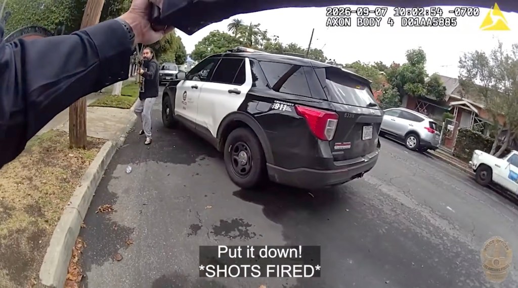 Moment madman with polesaw charges cops before he’s shot dead in bloody scene