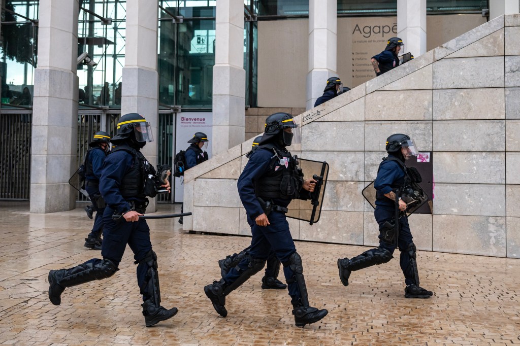 Boy, 15, arrested after being caught on video blasting fire in woman’s face during France’s student riots