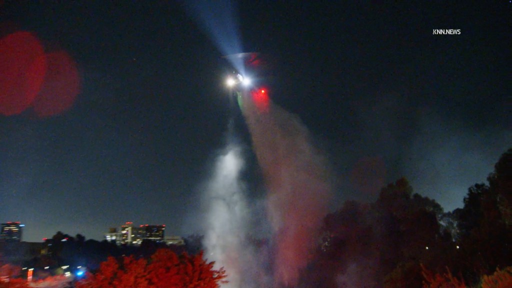Fast-moving wildfire breaks out in Los Angeles overnight as winds rage