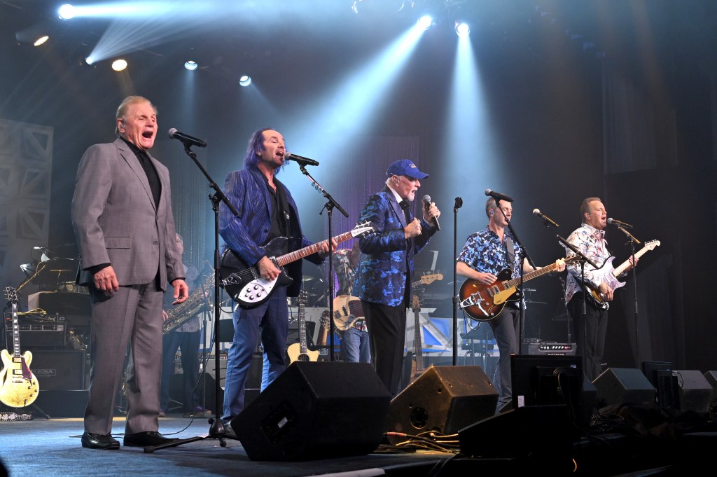 Footage of Beach Boys’ Mike Love sitting during performance goes viral as he battles ‘serious’ health challenges