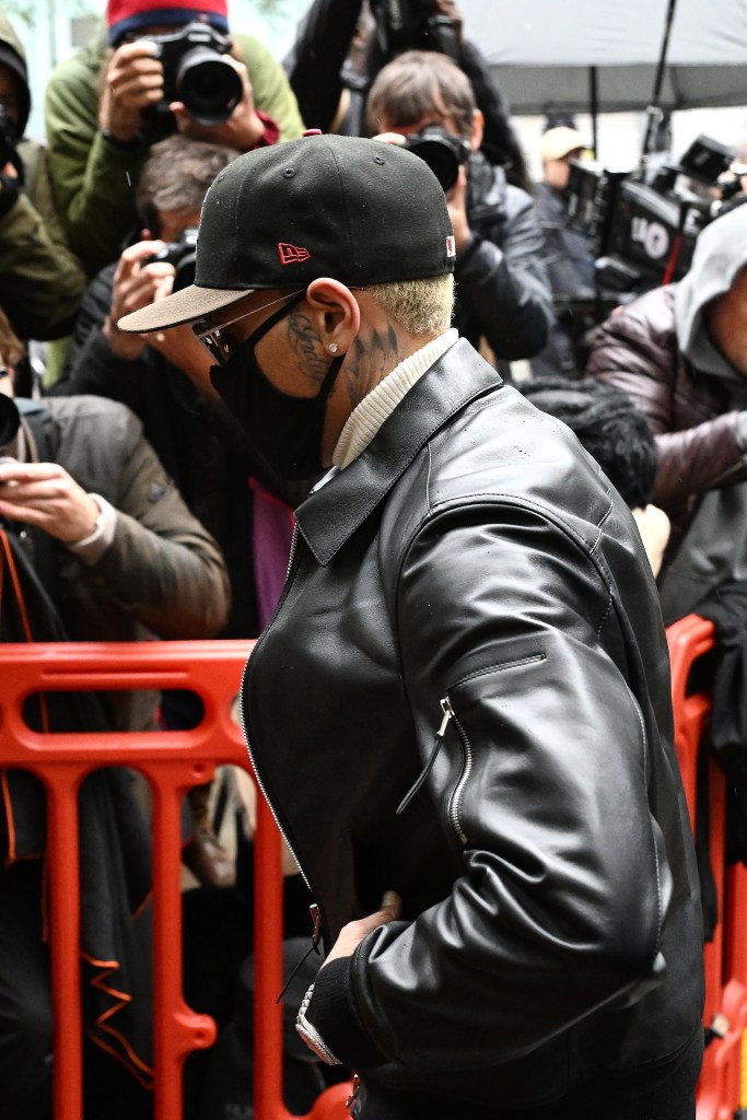 See Chris Brown repeatedly bash producer over head with bottle in London club — as he avoids jail time